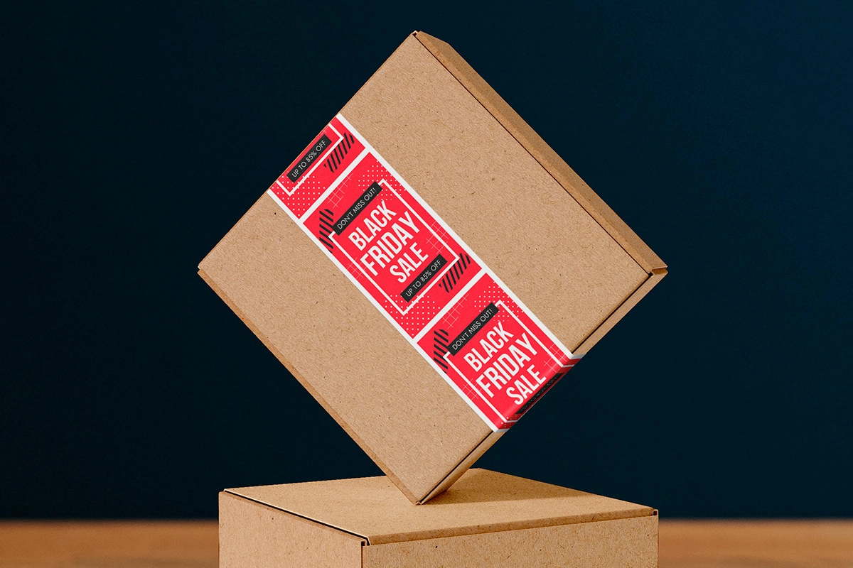 Custom packaging tape featuring bold red color with 'Black Friday' text, ideal for promotional branding and themed shipping during the holiday season.